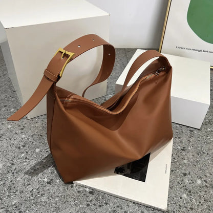 Adjustable Strap PU Leather Handbag - Premium Tote Bag from Trendsi - Just $39.99! Shop now at Handbags Specialist Headquarter