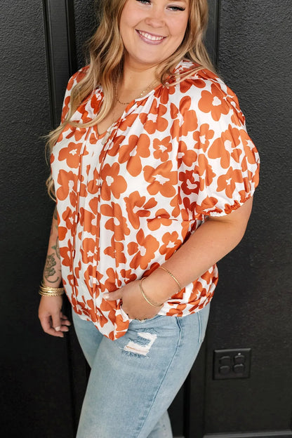 Plus Size Printed Tie Neck Short Sleeve Blouse - Premium Plus Size Shirts from Trendsi - Just $21! Shop now at Handbags Specialist Headquarter