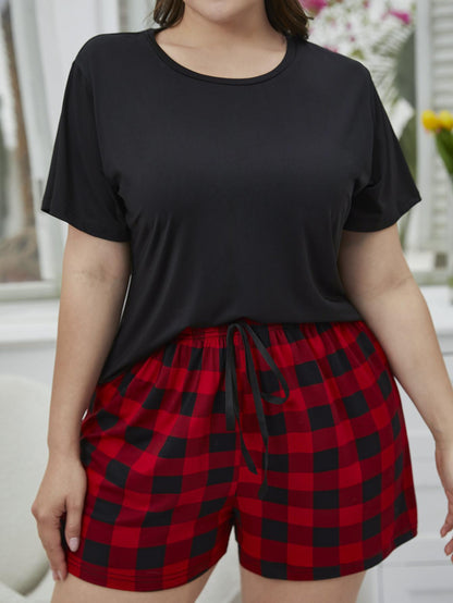 Plus Size Round Neck Tee Shirt and Plaid Shorts Lounge Set - Premium Plus Size Shirts from Trendsi - Just $28! Shop now at Handbags Specialist Headquarter