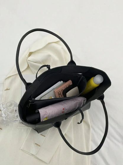 PU Leather Woven Handbag and Clutch Set - Premium handbags from Trendsi - Just $21.99! Shop now at Handbags Specialist Headquarter