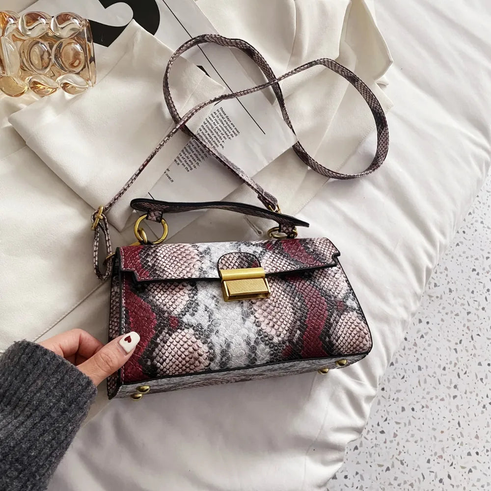 PU Leather Snakeskin Print Crossbody Bag - Premium Crossbody Bag from Trendsi - Just $35.99! Shop now at Handbags Specialist Headquarter