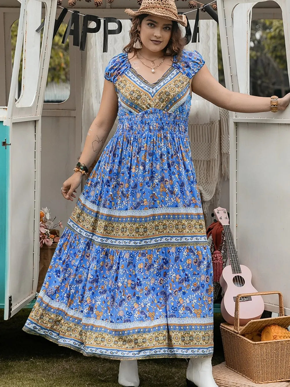 Plus Size Smocked Printed Cap Sleeve Dress - Premium Dresses from Trendsi - Just $38.99! Shop now at Handbags Specialist Headquarter