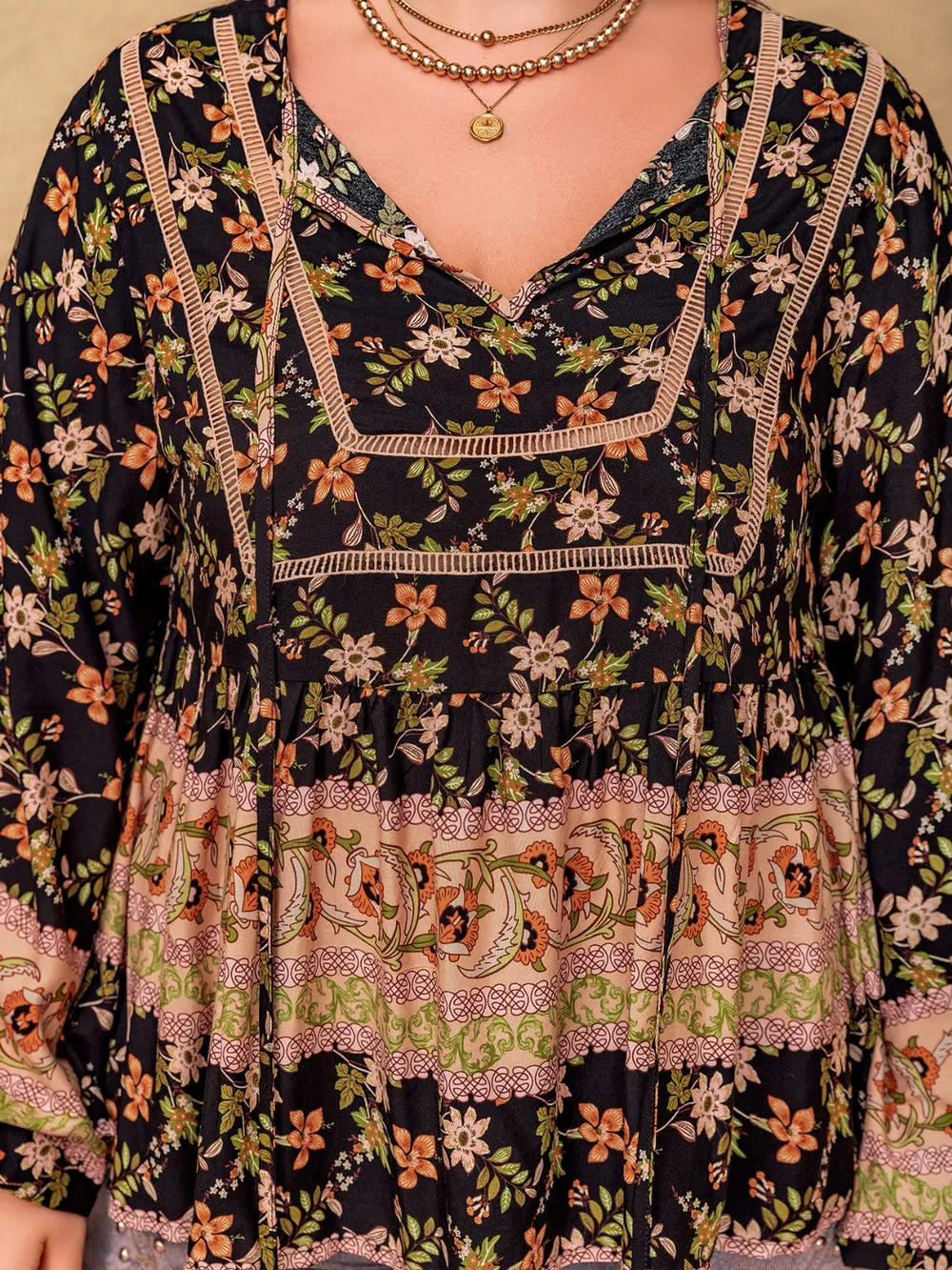 Plus Size Printed Tie Neck Balloon Sleeve Blouse - Premium Plus Size Shirts from Trendsi - Just $29.98! Shop now at Handbags Specialist Headquarter