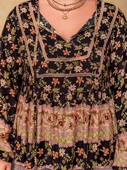 Plus Size Printed Tie Neck Balloon Sleeve Blouse - Premium Plus Size Shirts from Trendsi - Just $29.98! Shop now at Handbags Specialist Headquarter