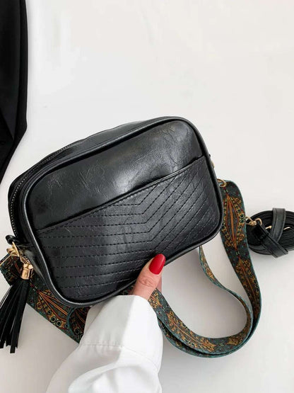 Tassel PU Leather Printed Strap Cassette Crossbody Bag - Premium Crossbody Bag from Trendsi - Just $22.99! Shop now at Handbags Specialist Headquarter