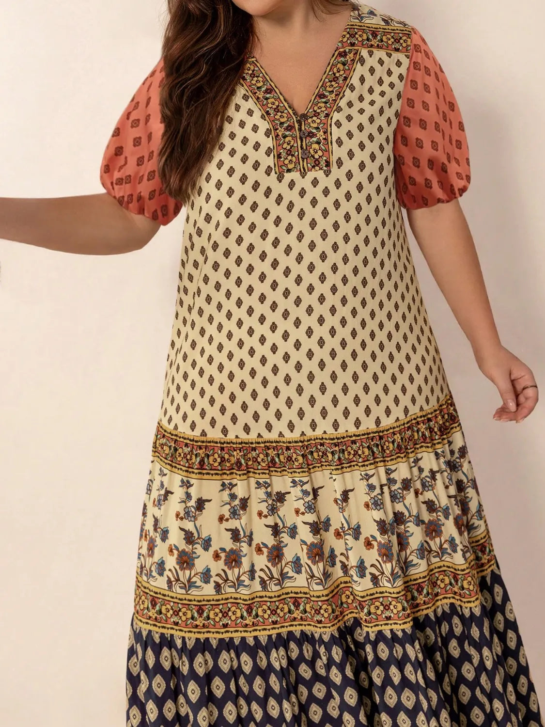 Plus Size Ruched Printed Short Sleeve Midi Dress - Premium Dresses from Trendsi - Just $52.99! Shop now at Handbags Specialist Headquarter