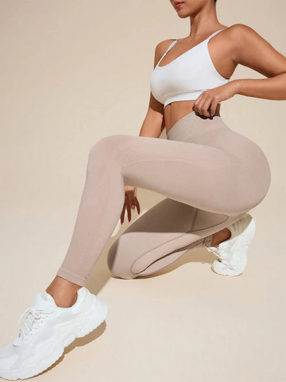 Solid High Rise Active Leggings - Premium Leggings from Trendsi - Just $32.04! Shop now at Handbags Specialist Headquarter