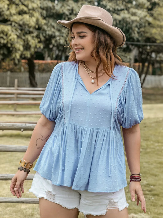 Plus Size Swiss Dot Tie Neck Short Sleeve Blouse - Premium Plus Size Shirts from Trendsi - Just $29.98! Shop now at Handbags Specialist Headquarter
