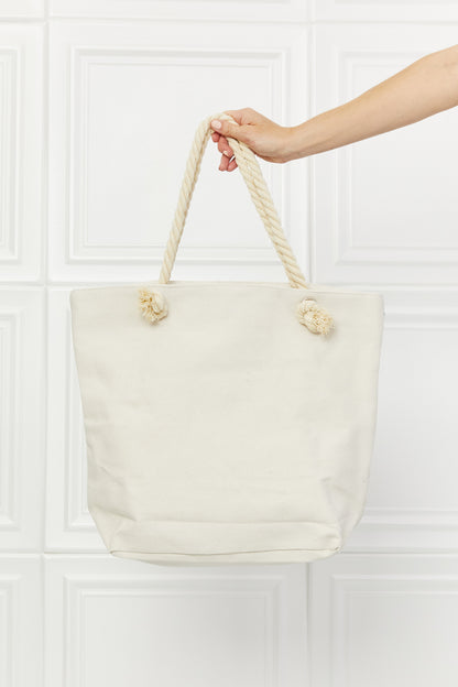Justin Taylor Picnic Date Tassel Tote Bag - Premium Tote Bag from Trendsi - Just $39.99! Shop now at Handbags Specialist Headquarter