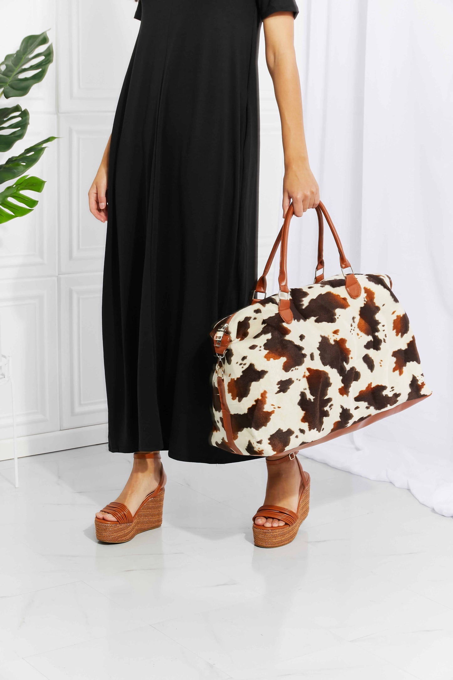 Animal Print Plush Weekender Bag - Premium Weekender Bag from Trendsi - Just $54.99! Shop now at Handbags Specialist Headquarter