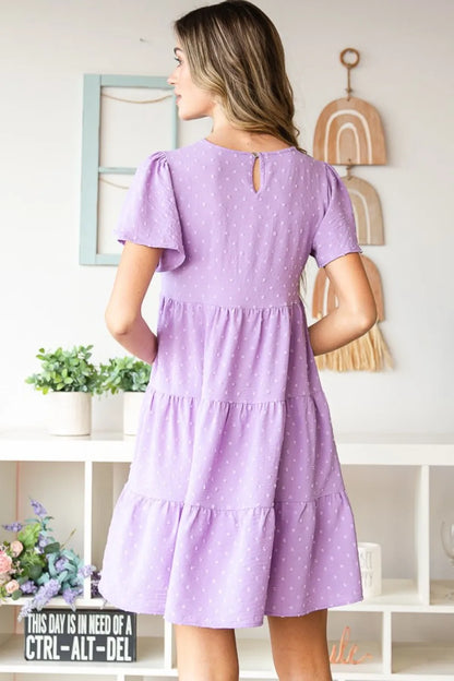 Heimish Full Size Swiss Dot Short Sleeve Tiered Dress - Premium Dresses from Trendsi - Just $39.99! Shop now at Handbags Specialist Headquarter