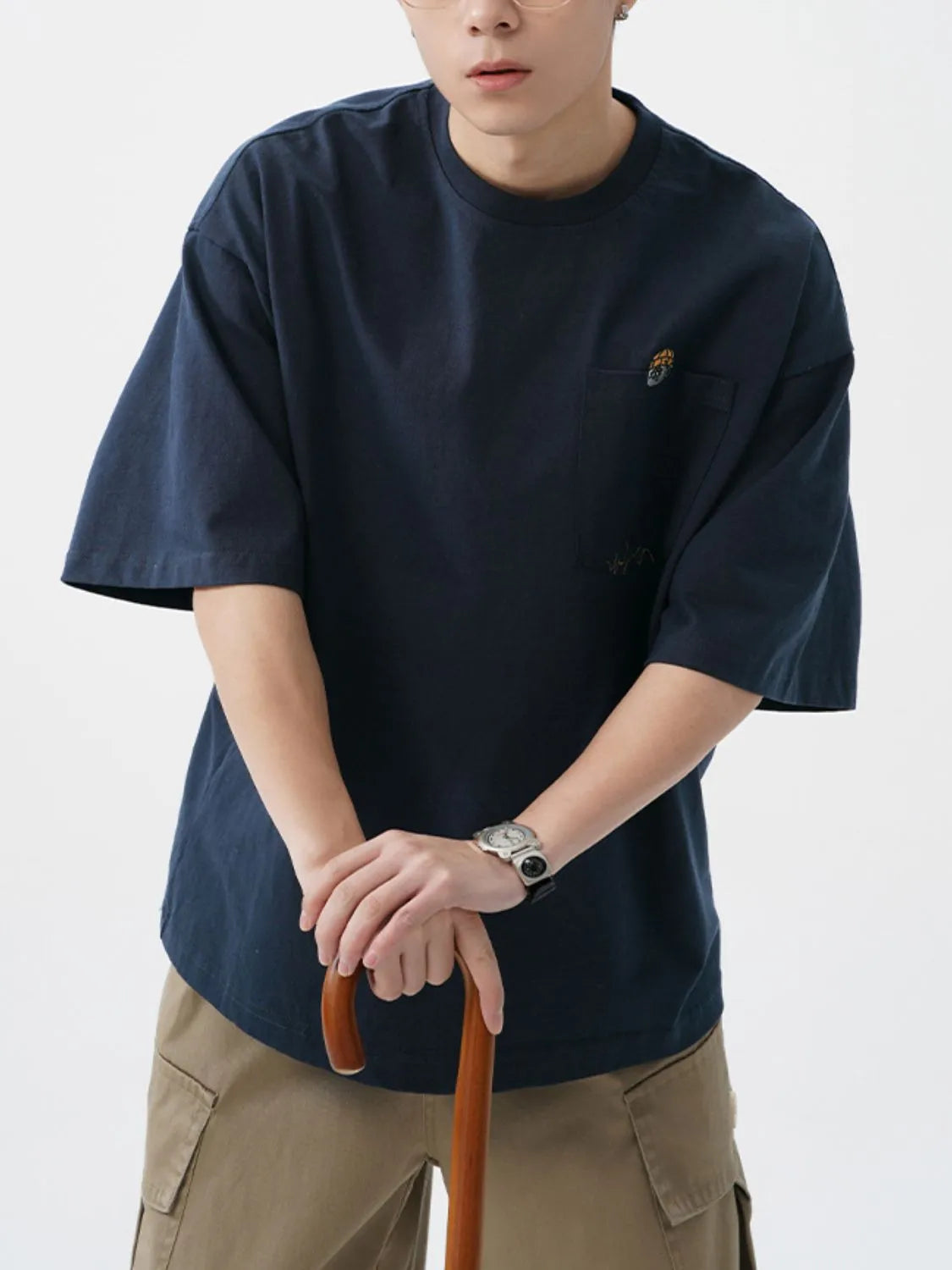 Men's Plus Size Round Neck Embroidered T-Shirt - Premium Men's T-Shirt from Trendsi - Just $30.99! Shop now at Handbags Specialist Headquarter