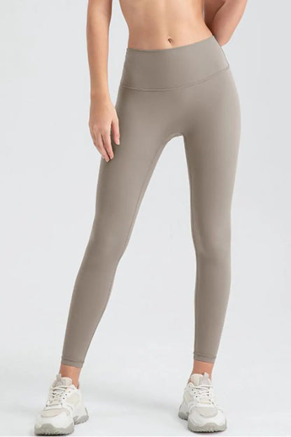 Wide Waistband Sport Leggings - Premium Leggings from Trendsi - Just $50.91! Shop now at Handbags Specialist Headquarter