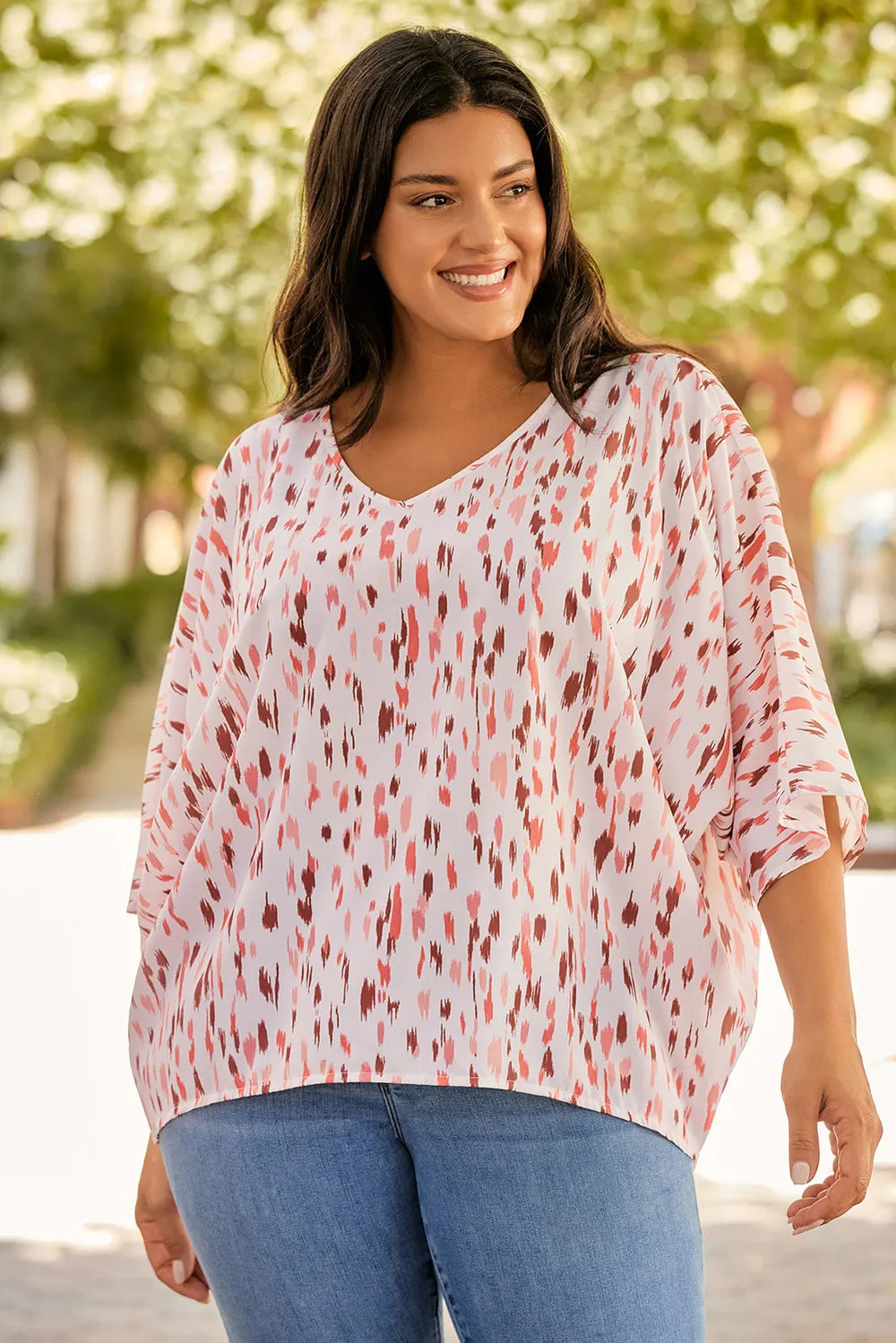 Plus Size Printed V-Neck Blouse - Premium Plus Size Shirts from Trendsi - Just $21! Shop now at Handbags Specialist Headquarter