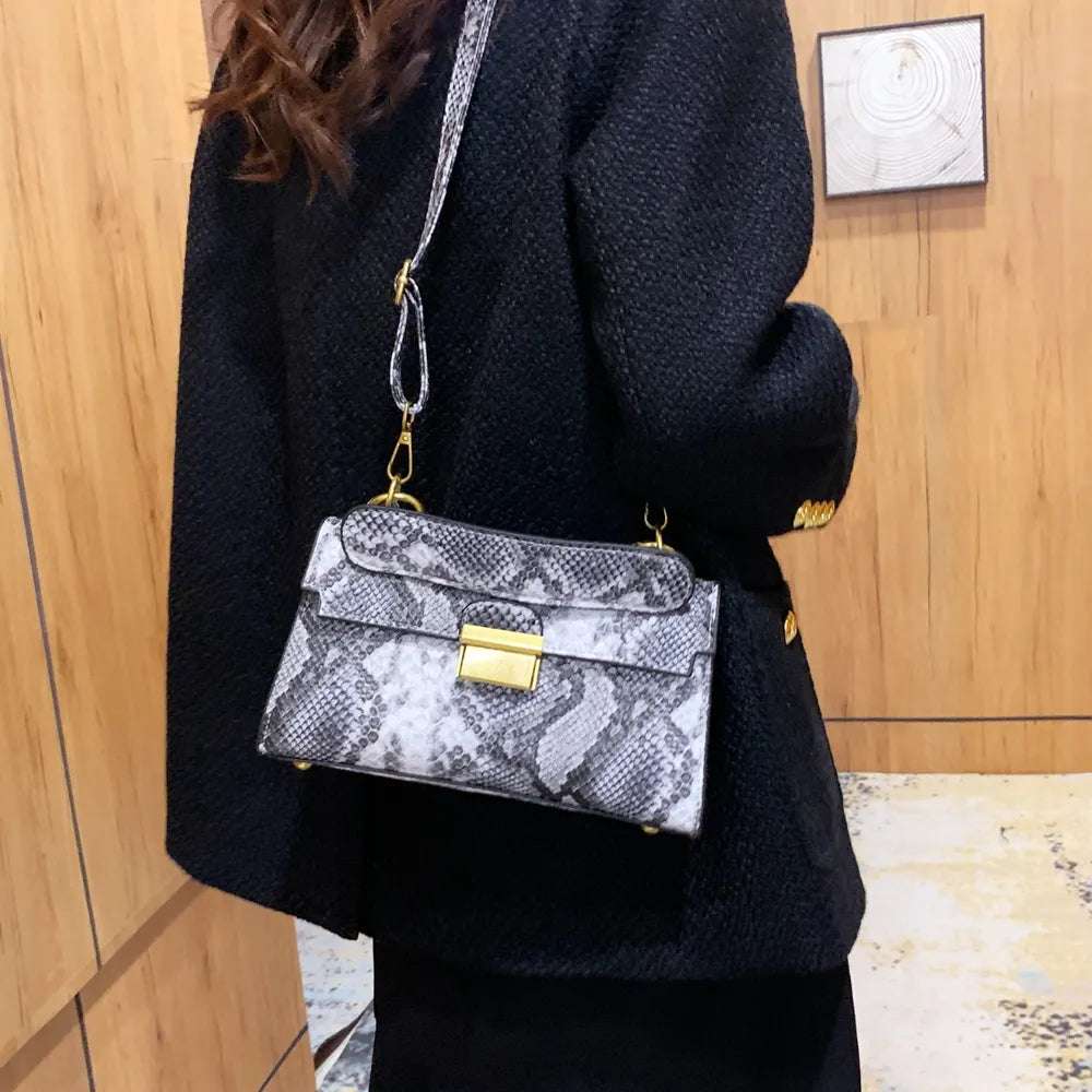 PU Leather Snakeskin Print Crossbody Bag - Premium Crossbody Bag from Trendsi - Just $35.99! Shop now at Handbags Specialist Headquarter