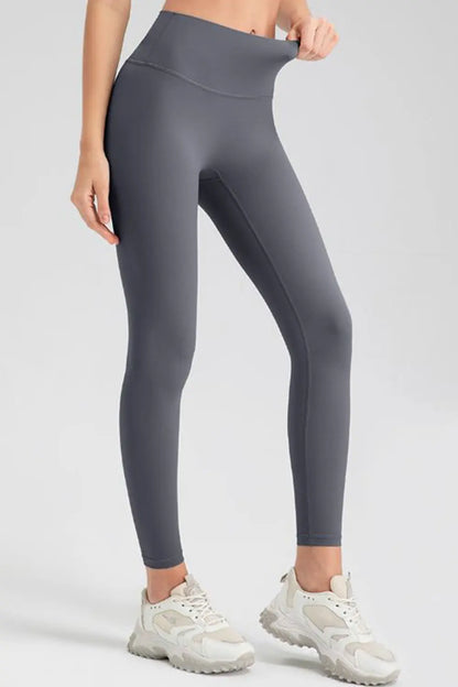 Wide Waistband Sport Leggings - Premium Leggings from Trendsi - Just $50.91! Shop now at Handbags Specialist Headquarter