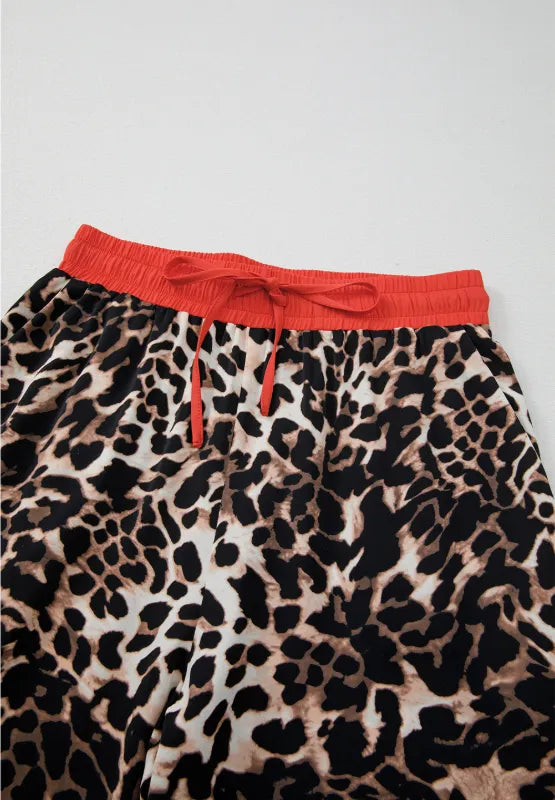 Contrast Trim Leopard Round Neck Top and Pants Lounge Set - Premium Sleepwear from Trendsi - Just $53.99! Shop now at Handbags Specialist Headquarter