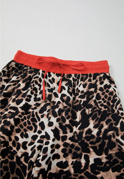 Contrast Trim Leopard Round Neck Top and Pants Lounge Set - Premium Sleepwear from Trendsi - Just $53.99! Shop now at Handbags Specialist Headquarter