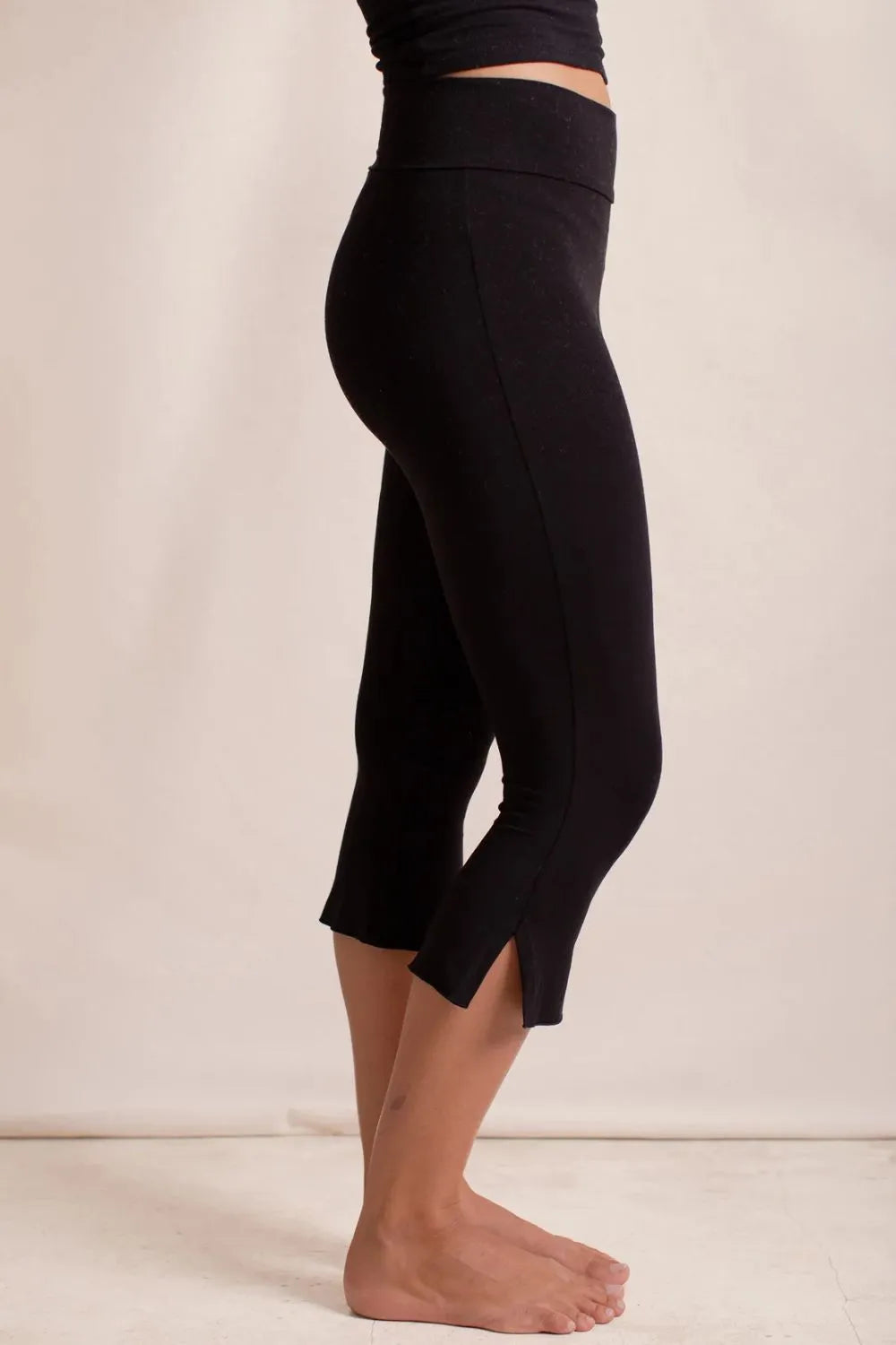 Side Slit Capris Leggings - Premium Leggings from Trendsi - Just $29.40! Shop now at Handbags Specialist Headquarter