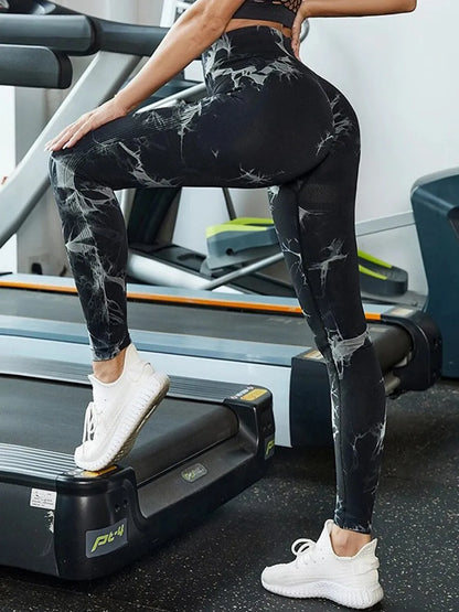 Tie-Dye High Waist Active Leggings - Premium Leggings from Trendsi - Just $41.40! Shop now at Handbags Specialist Headquarter