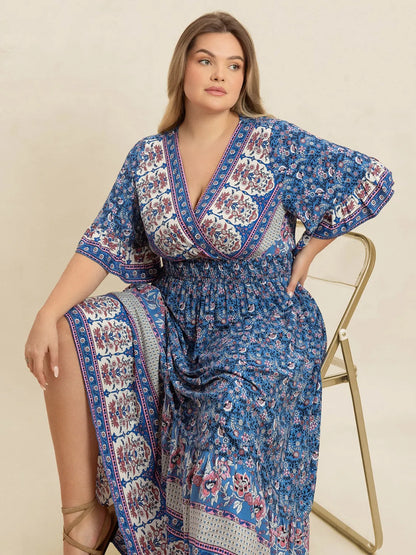 Plus Size Printed Surplice Half Sleeve Dress - Premium Dresses from Trendsi - Just $48.99! Shop now at Handbags Specialist Headquarter