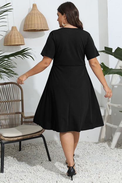 Plus Size Round Neck Openwork Dress - Premium Dresses from Trendsi - Just $30.99! Shop now at Handbags Specialist Headquarter