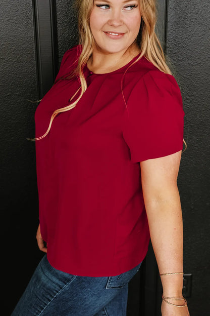 Plus Size Round Neck Short Sleeve Blouse - Premium Plus Size Shirts from Trendsi - Just $21! Shop now at Handbags Specialist Headquarter