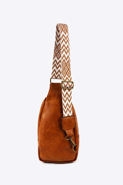 Random Pattern Adjustable Strap PU Leather Sling Bag - Premium Crossbody Bag from Trendsi - Just $32.99! Shop now at Handbags Specialist Headquarter