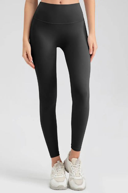 Wide Waistband Sport Leggings - Premium Leggings from Trendsi - Just $50.91! Shop now at Handbags Specialist Headquarter