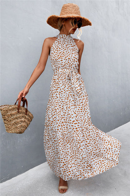 Printed Sleeveless Tie Waist Maxi Dress - Premium Maxi Dress from Trendsi - Just $36.99! Shop now at Handbags Specialist Headquarter