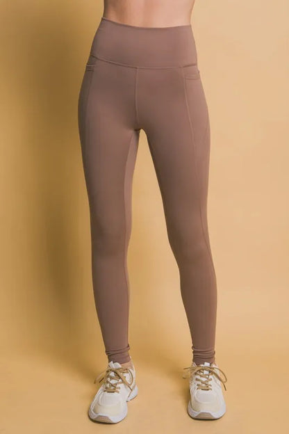 Love Tree High Waist Leggings with Side Pockets - Premium Leggings from Trendsi - Just $40.77! Shop now at Handbags Specialist Headquarter