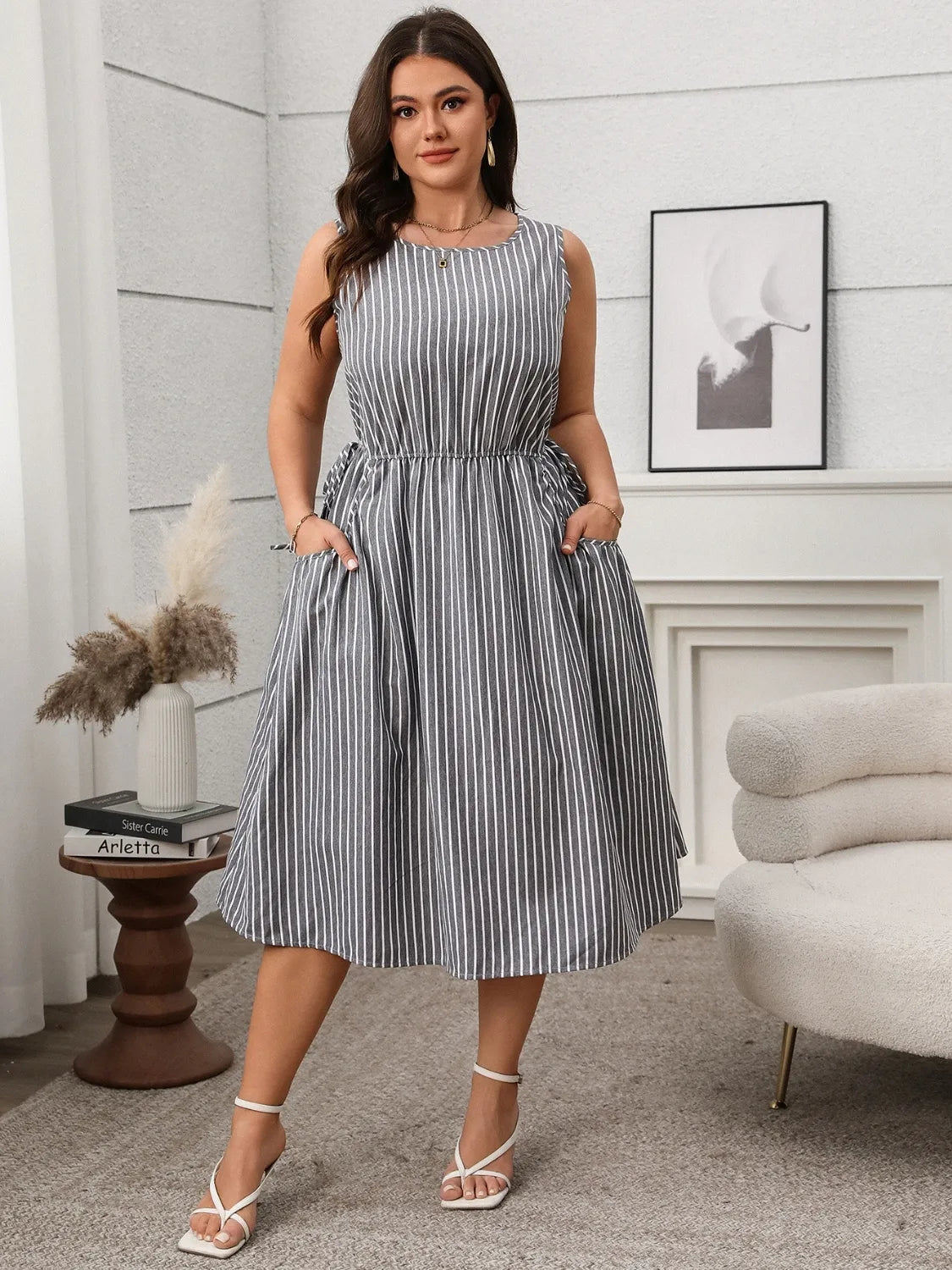 Plus Size Striped Round Neck Sleeveless Dress - Premium Dresses from Trendsi - Just $40.99! Shop now at Handbags Specialist Headquarter