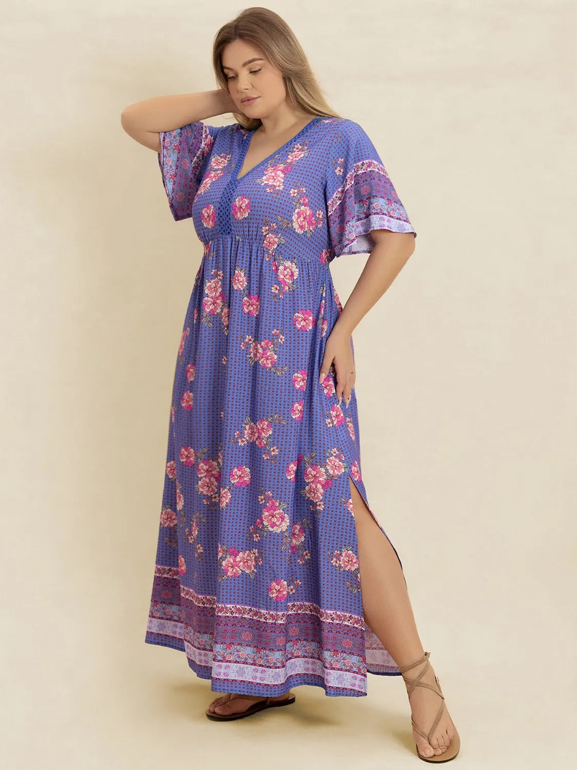Plus Size Printed V-Neck Flutter Sleeve Dress - Premium Dresses from Trendsi - Just $38.99! Shop now at Handbags Specialist Headquarter