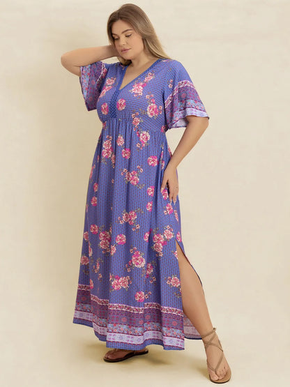 Plus Size Printed V-Neck Flutter Sleeve Dress - Premium Dresses from Trendsi - Just $38.99! Shop now at Handbags Specialist Headquarter