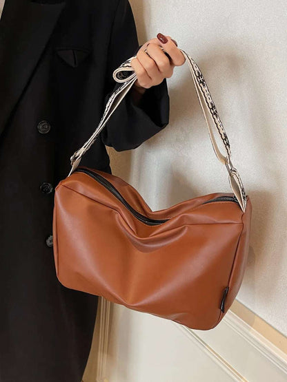 PU Leather Adjustable Strap Crossbody Bag - Premium Crossbody Bag from Trendsi - Just $26.99! Shop now at Handbags Specialist Headquarter