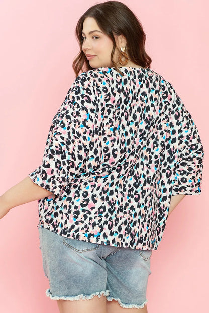 Plus Size Leopard V-Neck Three-Quarter Sleeve Blouse - Premium Plus Size Shirts from Trendsi - Just $24.32! Shop now at Handbags Specialist Headquarter