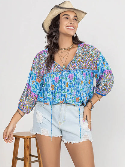 Plus Size Printed Tie Neck Balloon Sleeve Blouse - Premium Plus Size Shirts from Trendsi - Just $28! Shop now at Handbags Specialist Headquarter