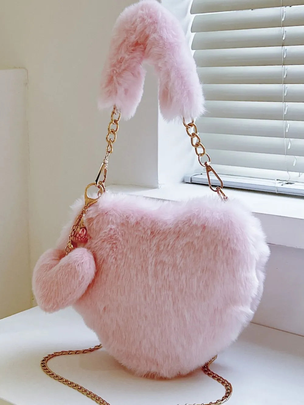 Heart Shape Faux Fur Handbag - Premium handbags from Trendsi - Just $19.99! Shop now at Handbags Specialist Headquarter