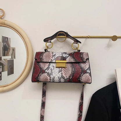 PU Leather Snakeskin Print Crossbody Bag - Premium Crossbody Bag from Trendsi - Just $35.99! Shop now at Handbags Specialist Headquarter