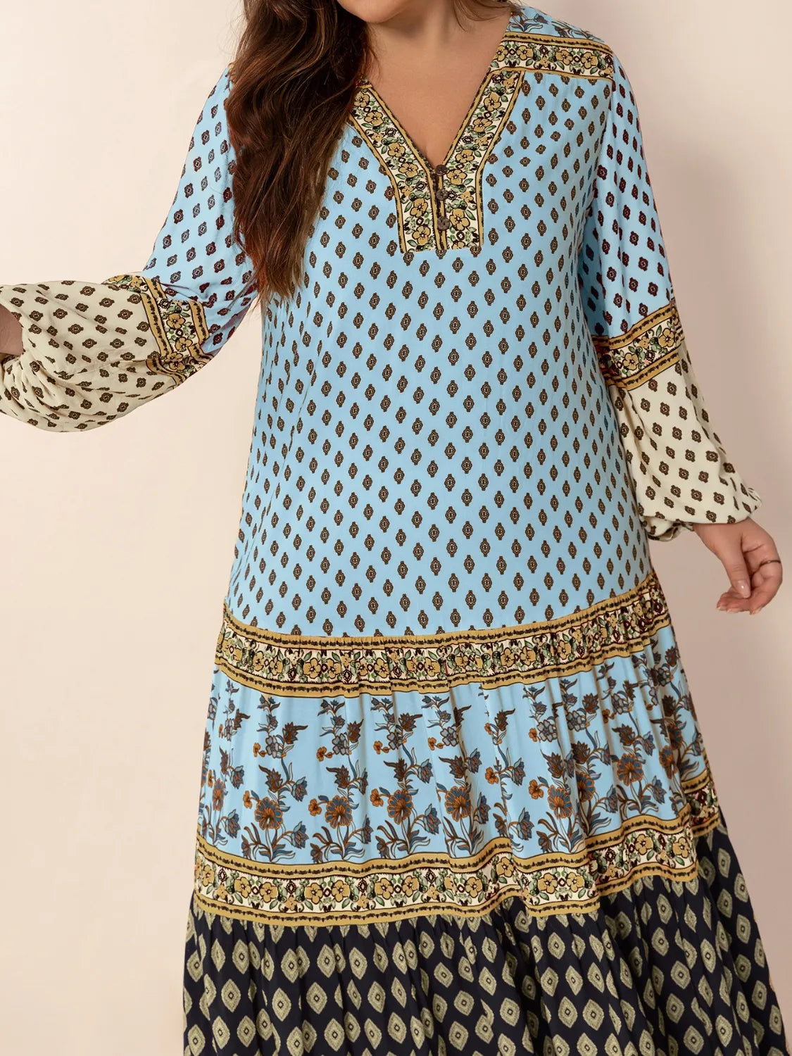 Plus Size Printed V-Neck Balloon Sleeve Maxi Dress - Premium Dresses from Trendsi - Just $52.99! Shop now at Handbags Specialist Headquarter