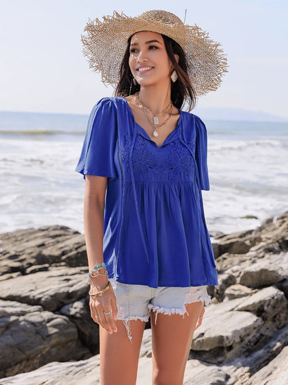 Lace Detail Tie Neck Short Sleeve Top - Premium Tops from Trendsi - Just $23.90! Shop now at Handbags Specialist Headquarter