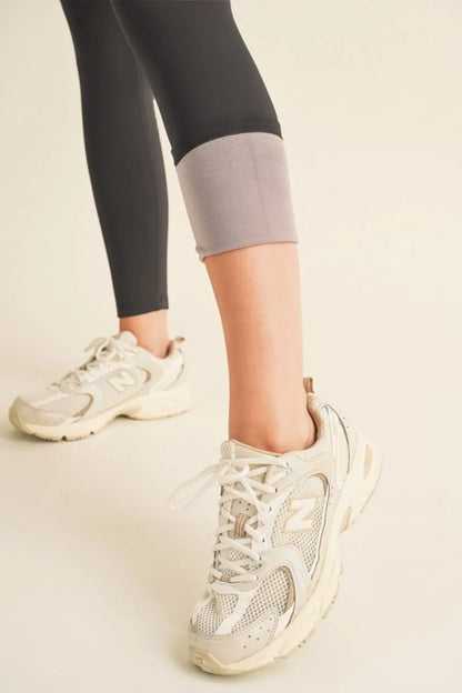 Yelete Full Size Fleece Lined High Waisted Leggings - Premium Leggings from Trendsi - Just $60.54! Shop now at Handbags Specialist Headquarter