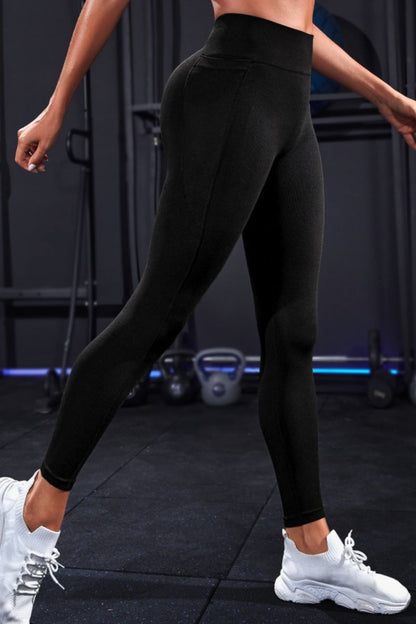 Wide Waistband Sports Leggings - Premium Leggings from Trendsi - Just $34.83! Shop now at Handbags Specialist Headquarter