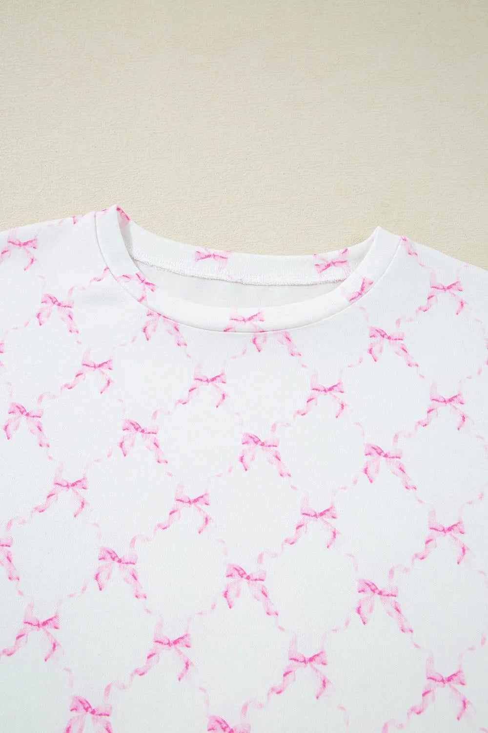 Bow Print Lettuce Trim Round Neck Top and Shorts Lounge Set - Premium Sleepwear from Trendsi - Just $32.14! Shop now at Handbags Specialist Headquarter