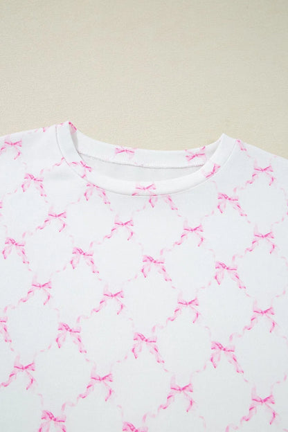 Bow Print Lettuce Trim Round Neck Top and Shorts Lounge Set - Premium Sleepwear from Trendsi - Just $32.14! Shop now at Handbags Specialist Headquarter