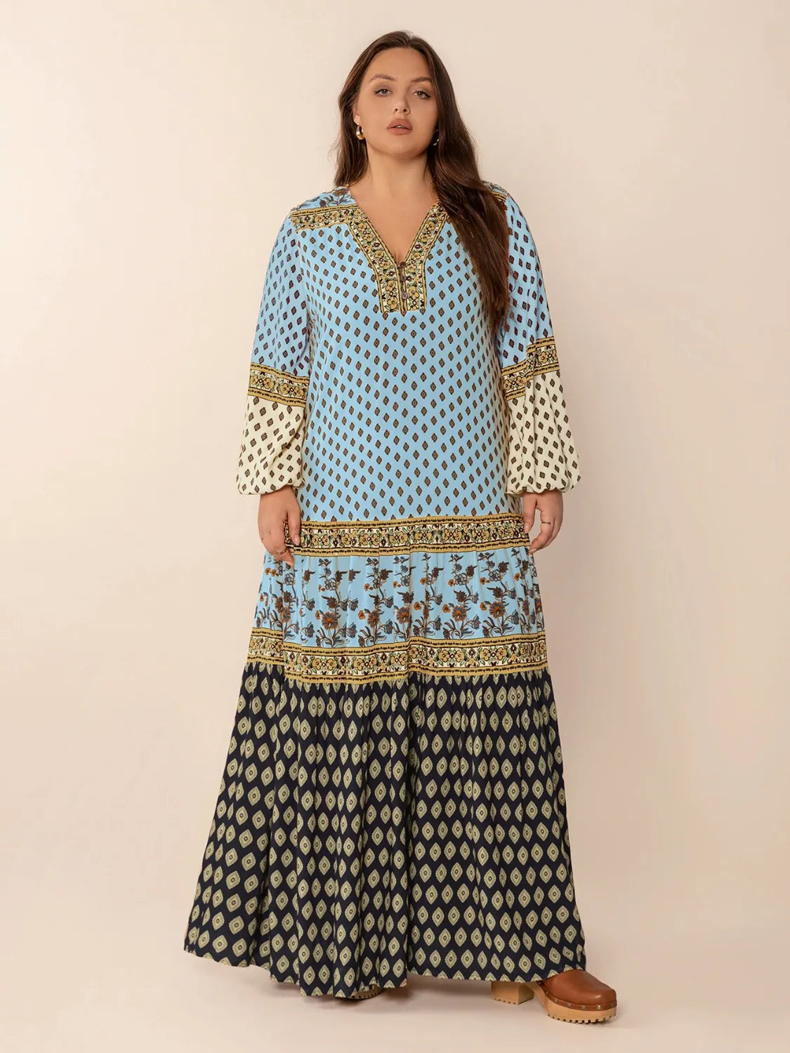 Plus Size Printed V-Neck Balloon Sleeve Maxi Dress - Premium Dresses from Trendsi - Just $52.99! Shop now at Handbags Specialist Headquarter