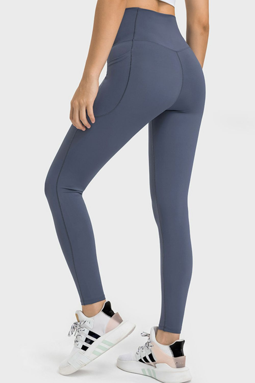 Millennia V-Waist Yoga Leggings with Pockets - Premium Leggings from Trendsi - Just $59.76! Shop now at Handbags Specialist Headquarter
