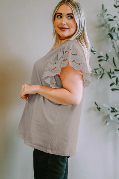 Plus Size Eyelet Round Neck Short Sleeve Blouse.