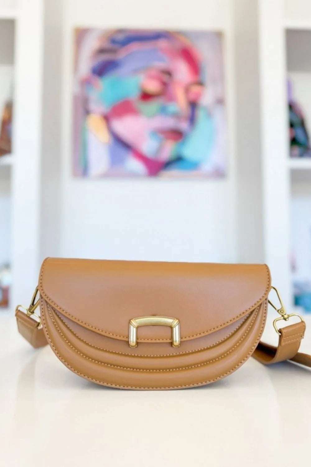 Fame Buckle Closure Crescent Faux Leather Crossbody Bag - Premium Crossbody Bag from Trendsi - Just $53.99! Shop now at Handbags Specialist Headquarter