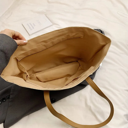 Contrast Straw Braided Handbag - Premium Tote Bag from Trendsi - Just $32.99! Shop now at Handbags Specialist Headquarter